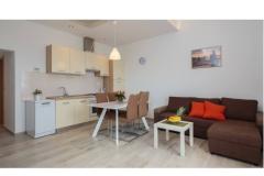 Apartmanok Ujaković Apartman 2 – A5+1 foto 1