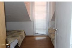 Doogaloo Apartmanok Szoba 5 – S-201 foto 1